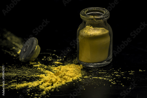 Yellow colorant powder jar