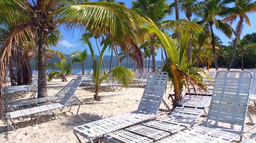 A lot of empty sunchairs on a beach in cayo levantado, samana, domenican republic photo
