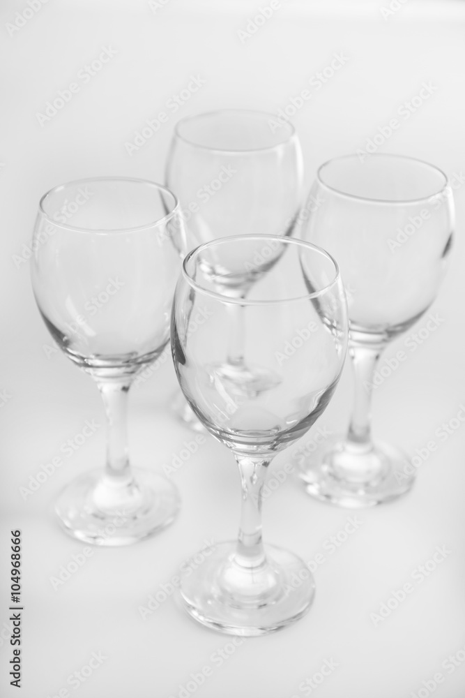 Wineglasses on white table closeup