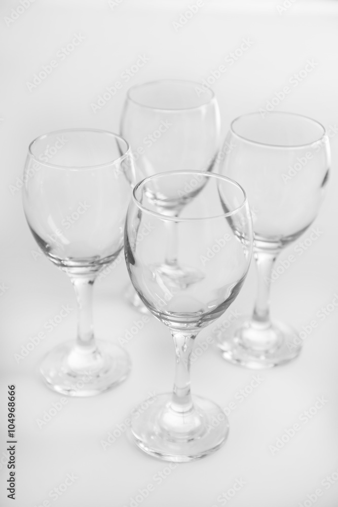 Wineglasses on white table closeup Wineglasses on white table closeup