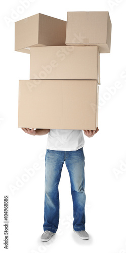 Man holding pile of carton boxes isolated on white background
