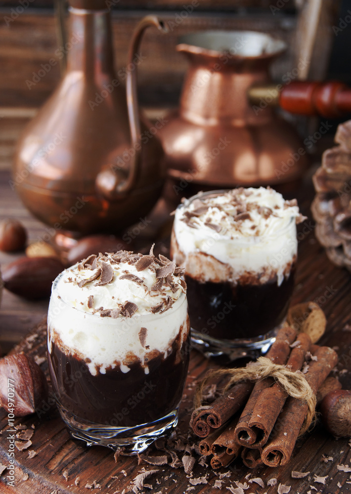hot chocolate in glass cups and cream with nuts hot chocolate in glass cups and cream with nuts