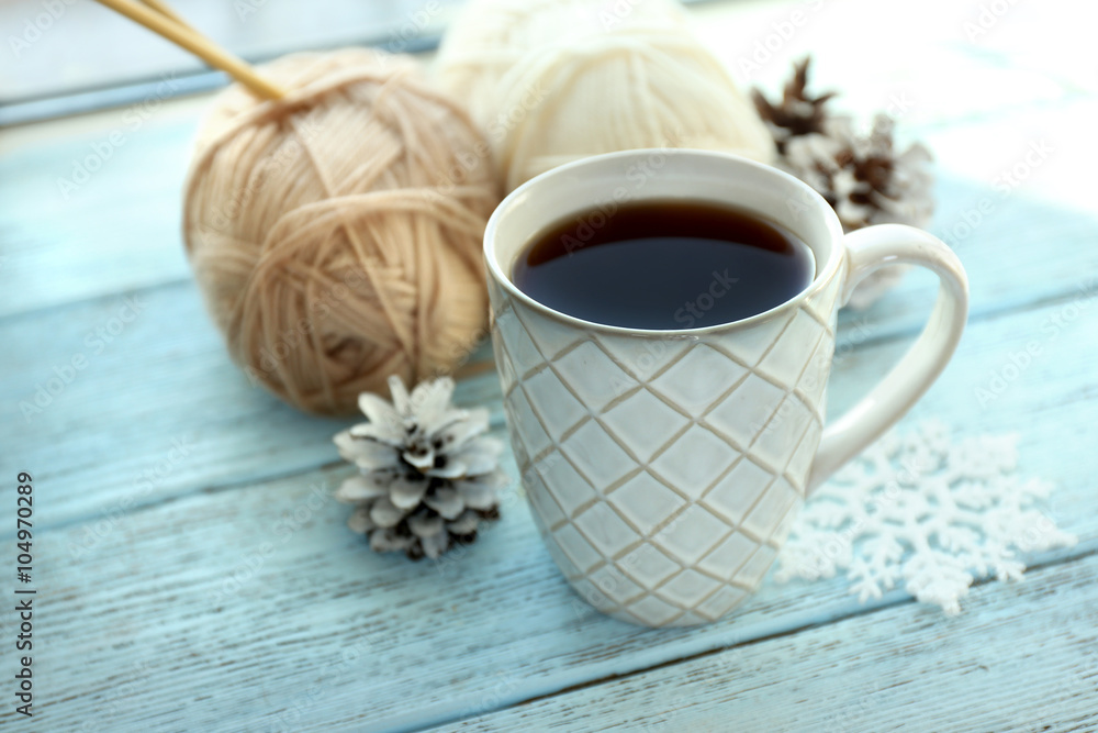 Beautiful winter composition with cup of hot drink, on wooden table Beautiful winter composition with cup of hot drink, on wooden table