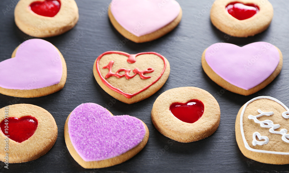 Assortment of love cookies on grey background Assortment of love cookies on grey background
