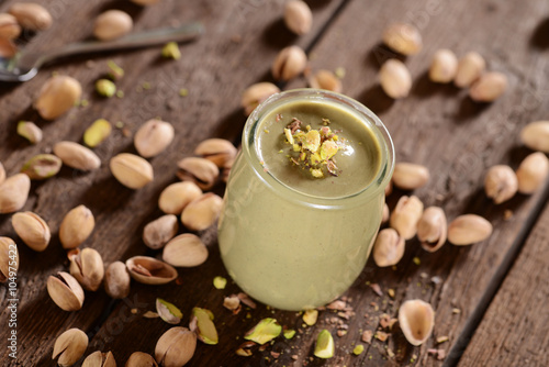 Fresh pistachios cream in small jar