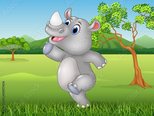 Cartoon funny rhino posing in the jungle