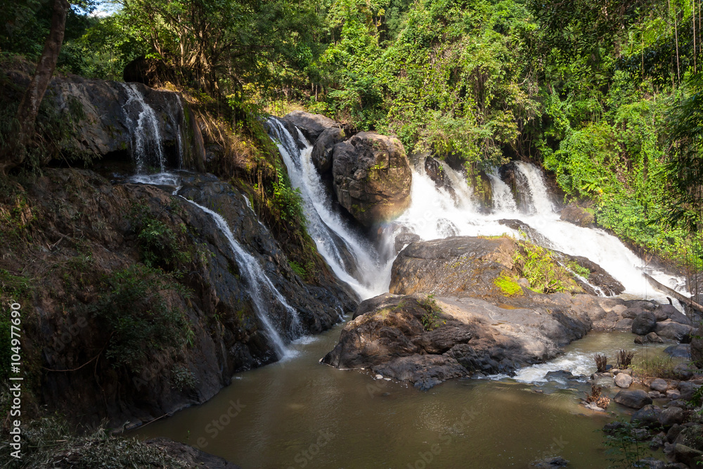Pha suea waterfall, tham pla–namtok pha suea national park, Thailand. in summer Pha suea waterfall, tham pla–namtok pha suea national park, Thailand. in summer