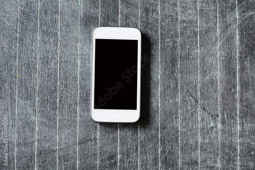 Mobile phone on a blackboard