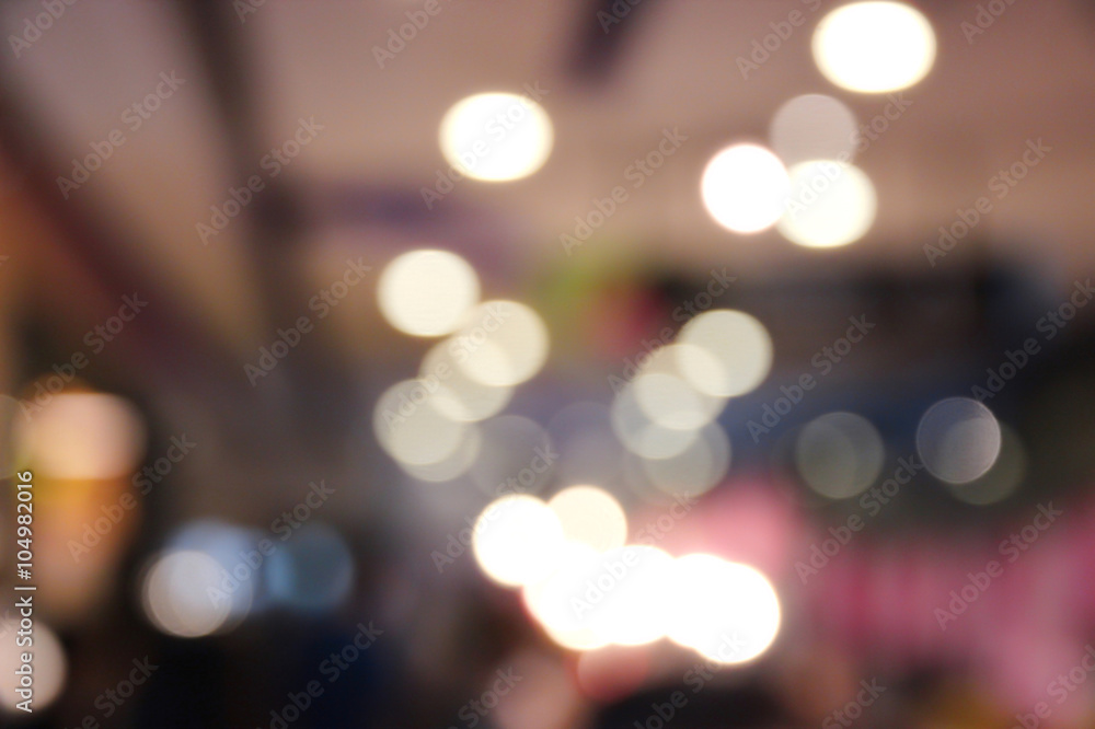 blurred image with customers in department store for background usage . blurred image with customers in department store for background usage .