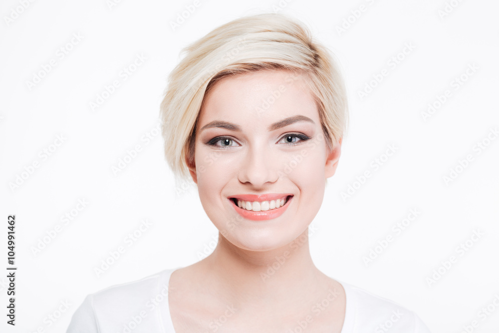 Smiling cute woman looking at camera Smiling cute woman looking at camera