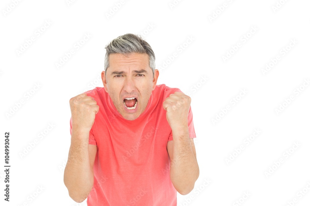 Angry man shouting in front of the camera Angry man shouting in front of the camera