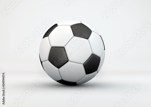 Soccer ball with shadows on gray background.