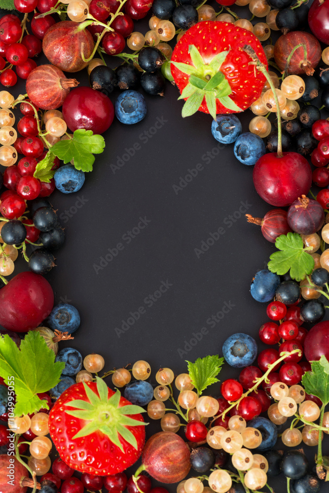black background for text with fresh garden berries black background for text with fresh garden berries