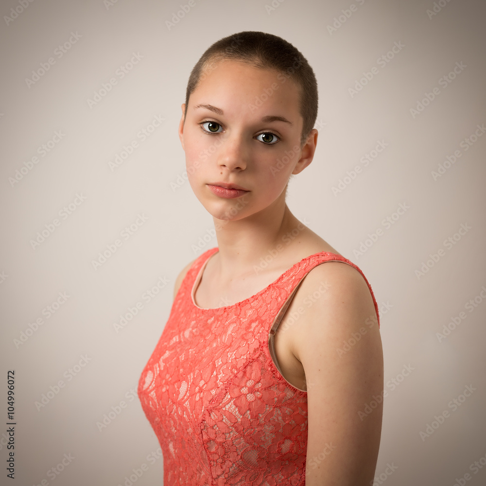 Beautiful Young Teenage Girl With Shaven Head Stock Photo | Adobe Stock