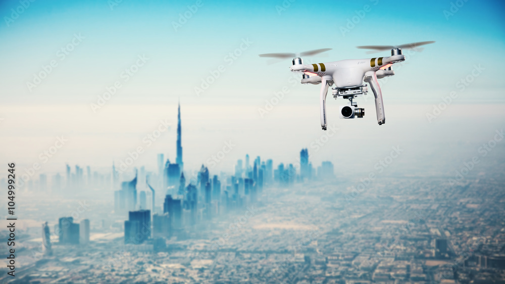 Drone flying above Dubai city panorama Photos | Adobe Stock