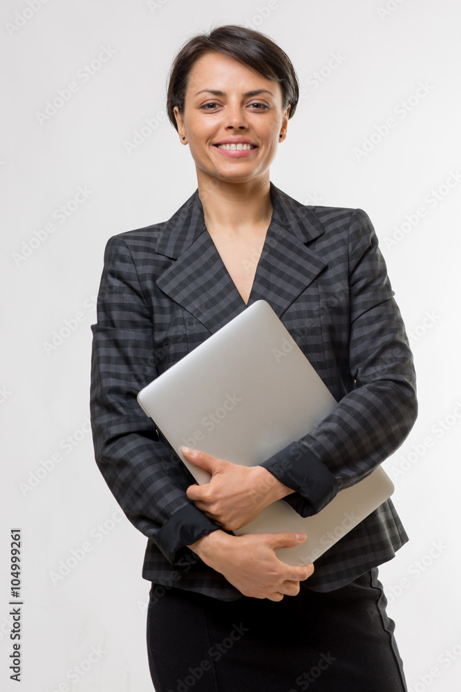Young attractive business woman in a studio Young attractive business woman in a studio