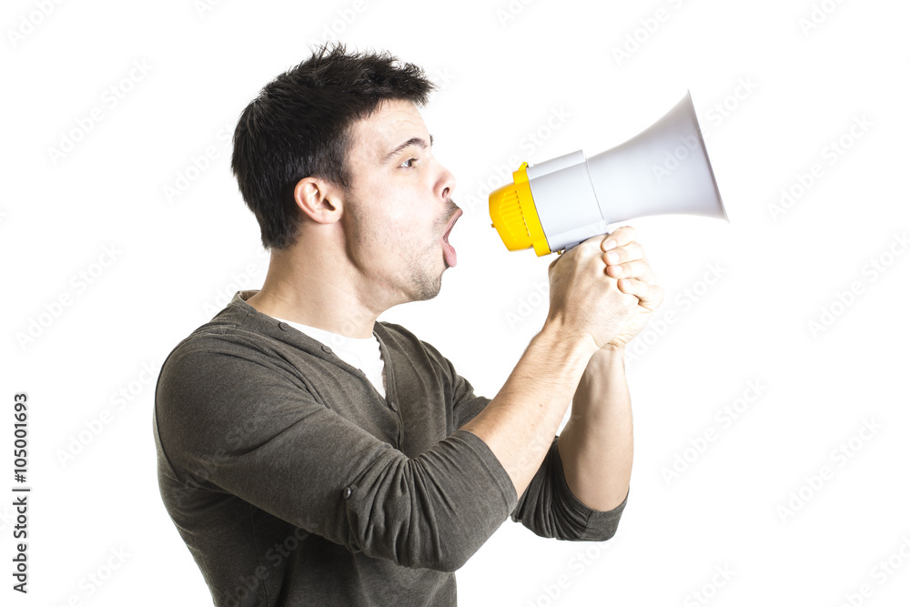 Young man shouting with megaphone on a white background Young man shouting with megaphone on a white background