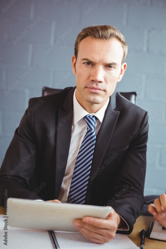 Businessman using digital tablet Businessman using digital tablet