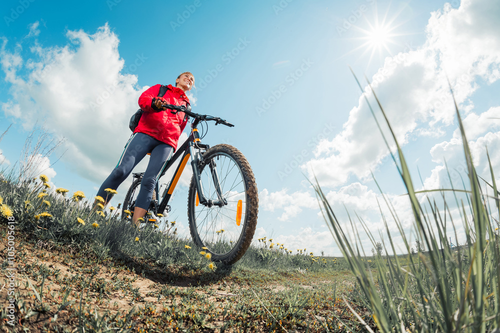 Naklejka premium Lady with bicycle