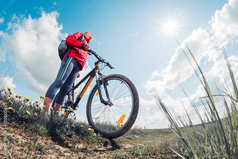 Naklejka premium Lady with bicycle