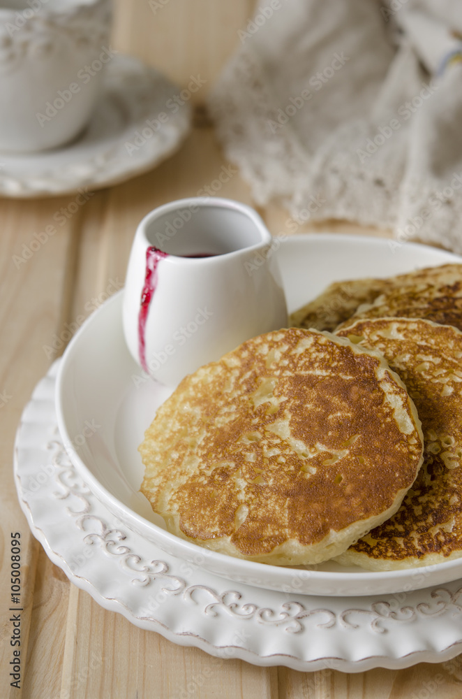 Pancake with jam from the black currant for a breakfast Pancake with jam from the black currant for a breakfast