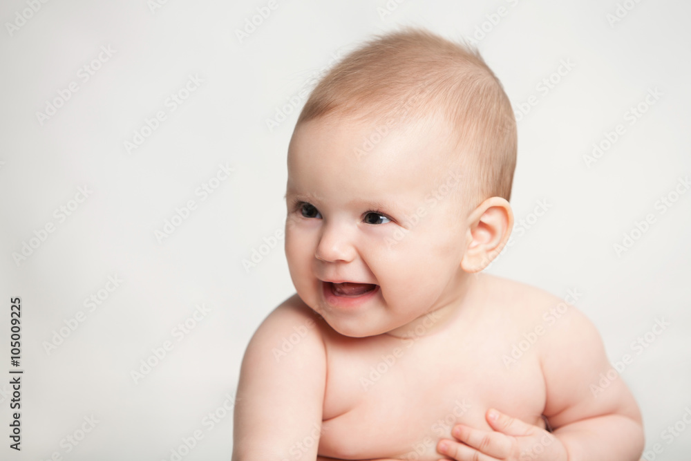 baby girl smiling sitting on white background baby girl smiling sitting on white background