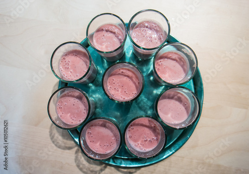 strawberry smoothie on a tray