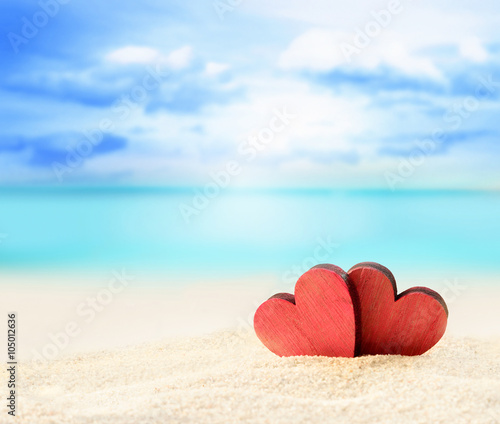 Two hearts on the summer beach