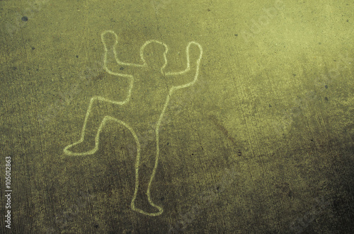 accident with tire skid marks leading over the body.