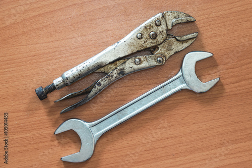 Wrench and spanner on wood background,concept for labors day and fathers day background.