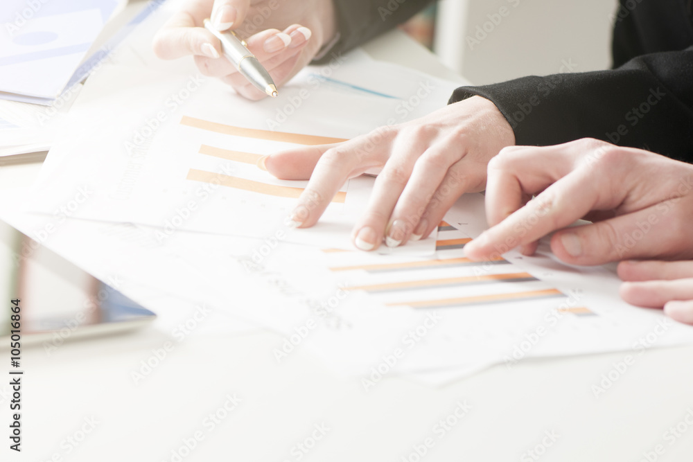 Business people discussing budget and anlaysis company Business people discussing budget and anlaysis company