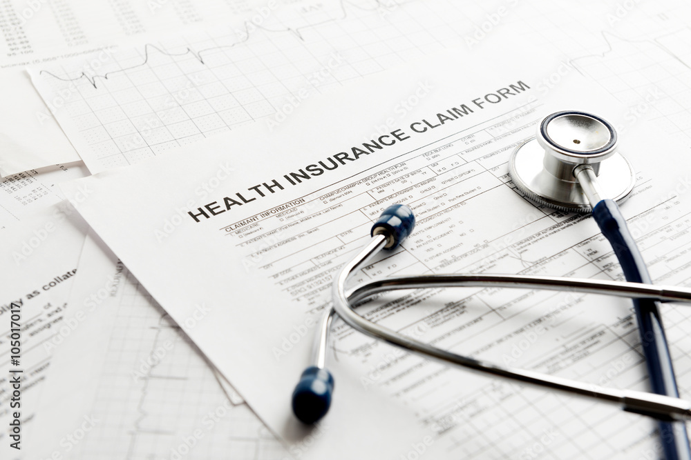 Health insurance form with stethoscope concept for life planning Health insurance form with stethoscope concept for life planning