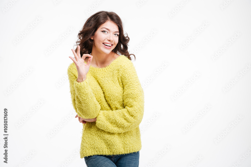 Portrait of a smiling woman showing ok sign Portrait of a smiling woman showing ok sign
