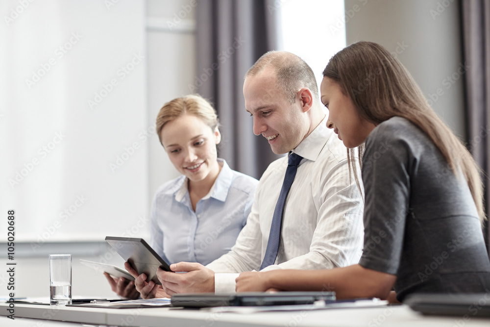 smiling business people with tablet pc in office smiling business people with tablet pc in office