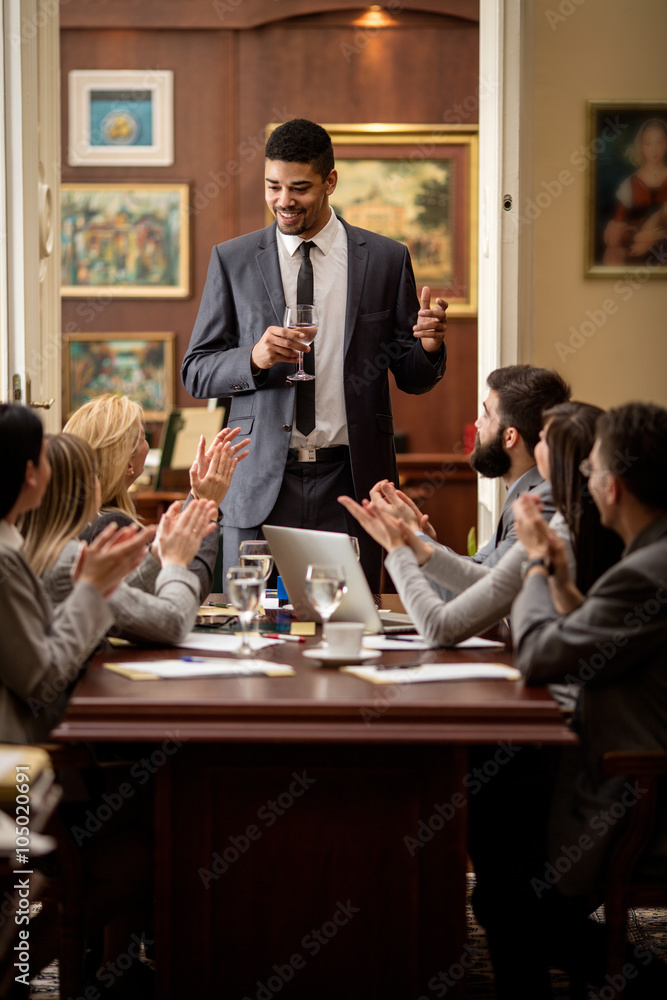 business group applauding during corporate meeting business group applauding during corporate meeting