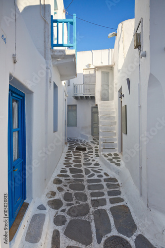 Traditional architecture in the town of Mykonos and characteristic narrow streets for pedestrians.