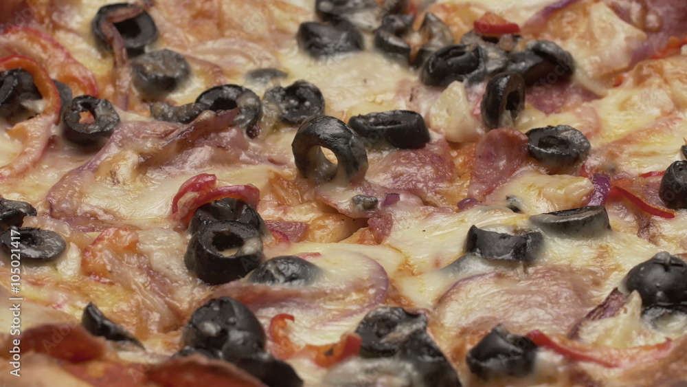 Rustic italian pizza with pepperoni, mozzarella and olive Rustic italian pizza with pepperoni, mozzarella and olive