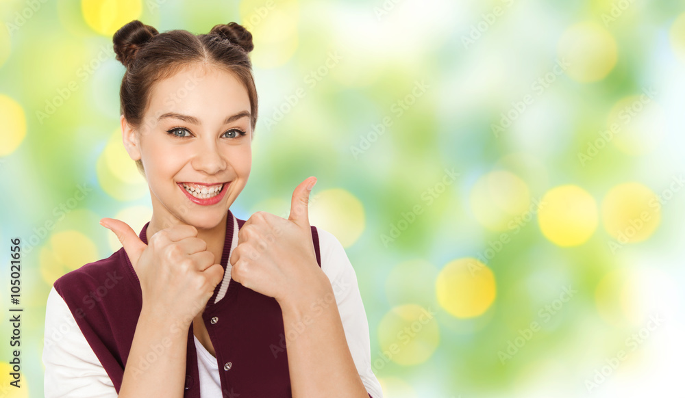 happy teenage girl showing thumbs up happy teenage girl showing thumbs up