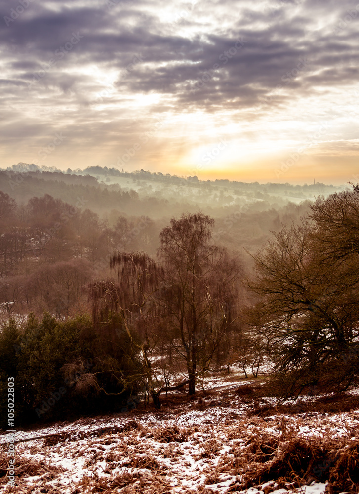 View over the hills on a frosty day, with snow on the ground View over the hills on a frosty day, with snow on the ground