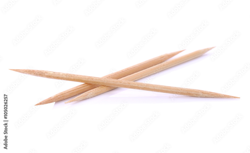 Wooden toothpicks on white background isolate Wooden toothpicks on white background isolate