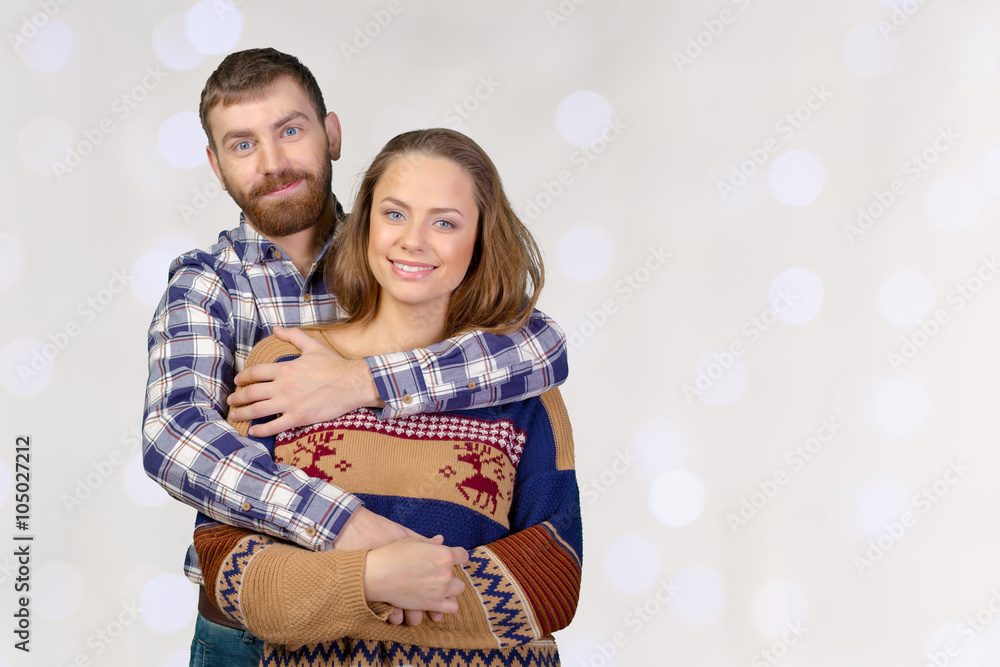 Fototapeta premium Cheerful young couple standing