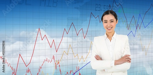 Composite image of smiling businesswoman looking at the camera