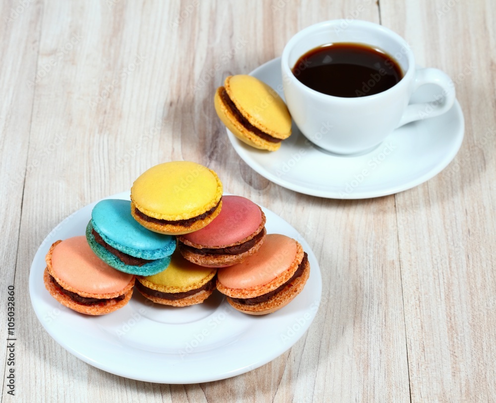 Macrons with cup of coffee Macrons with cup of coffee