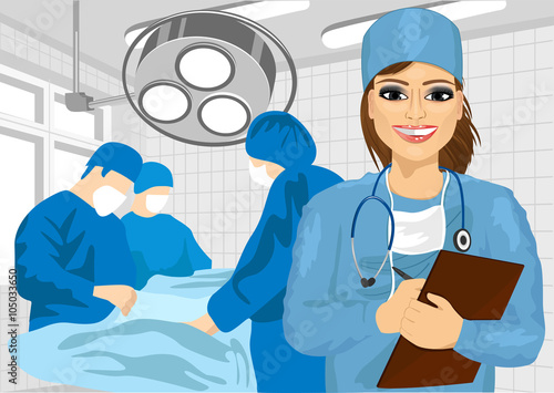 female surgical nurse in operating room holding clipboard
