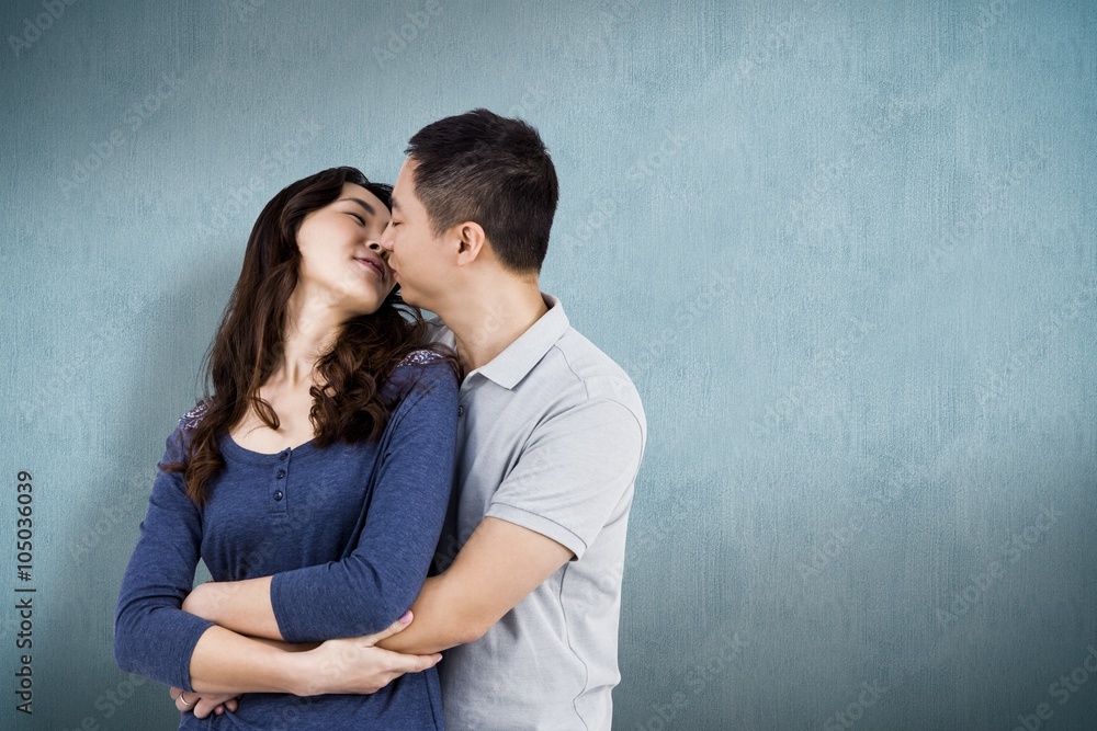 Composite image of affectionate couple embracing each other Composite image of affectionate couple embracing each other