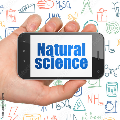 Science concept: Hand Holding Smartphone with Natural Science on display