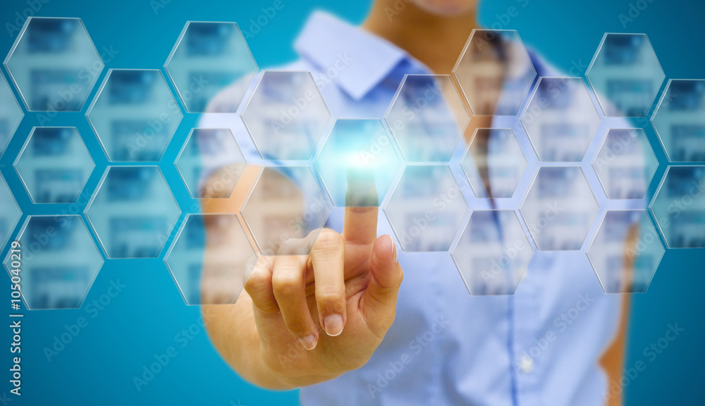 Businesswoman in his office using tactile interface Businesswoman in his office using tactile interface