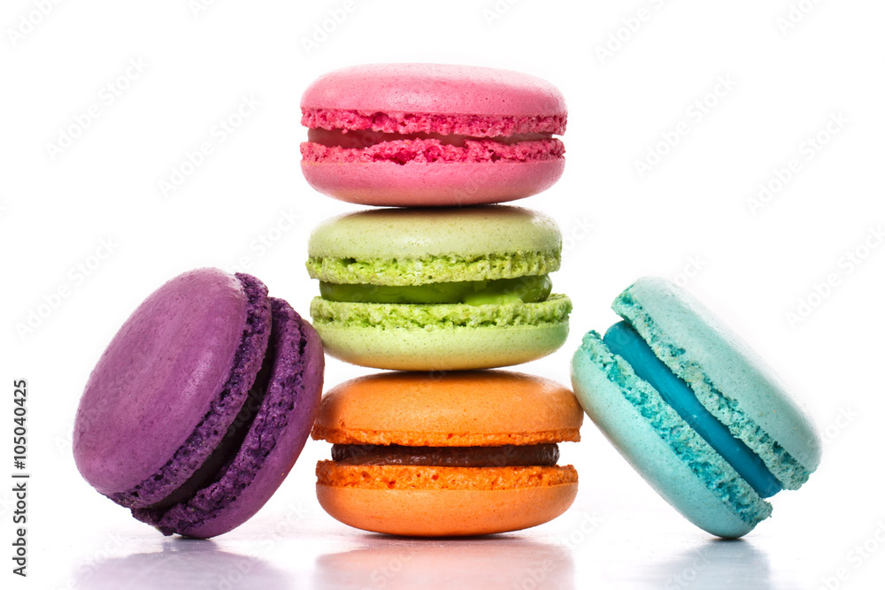 Collection of brightly colored French macarons on white backgrou Collection of brightly colored French macarons on white backgrou