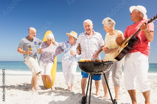 Senior friends having a barbecue