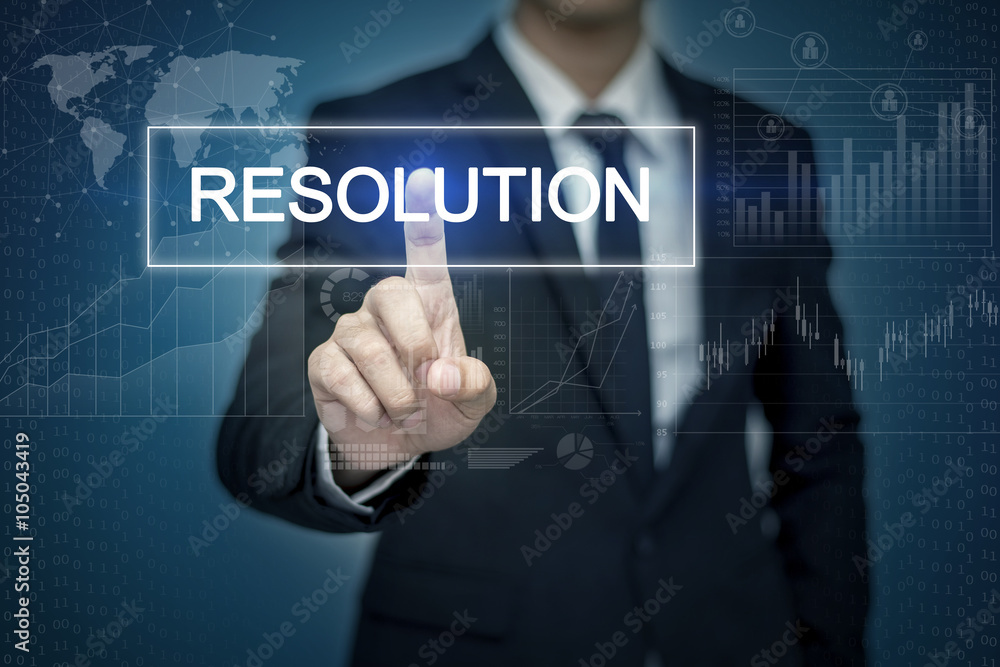 Businessman hand touching RESOLUTION button on virtual screen Businessman hand touching RESOLUTION button on virtual screen